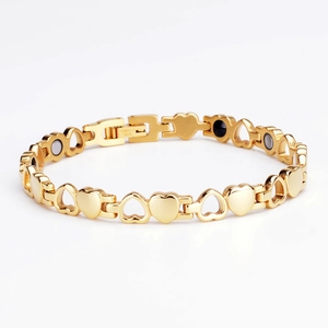 Gold magnetic therapy bracelet for women featuring heart links and healing stones