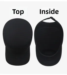 Top and interior view of a black adjustable cotton cadet cap showing texture and buckle