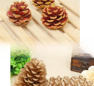 Natural gold and red glittered pine cones for rustic holiday decor and photography props