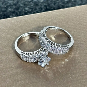 Macro shot of sparkling square zircon bridal ring set with shimmering starburst effects