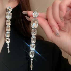 Luxurious silver long tassel earrings with sparkling clear crystals and stones