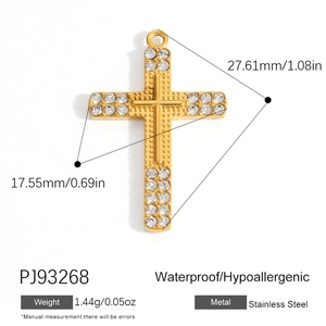 18K gold plated stainless steel cross pendant with crystals measuring 27.61x17.55mm