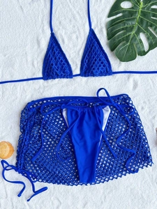 Royal blue three-piece bikini set with halter top and fishnet mesh beach skirt