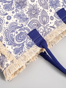 Bohemian paisley canvas tote bag with beige fringe and blue ethnic pattern