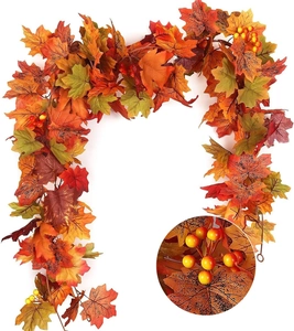 Macro view of artificial autumn maple leaves with realistic veins and orange berries