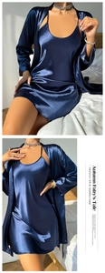 Detailed view of dark blue satin silk pajama set featuring a camisole dress and robe