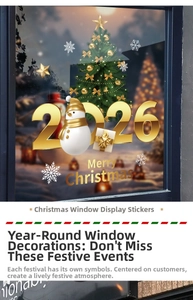 Detail of Christmas window stickers with golden 2026 sign, snowman and festive tree