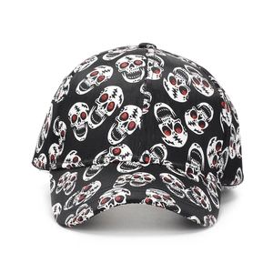 Black baseball cap with white skull prints and red glitter eyes on a white background