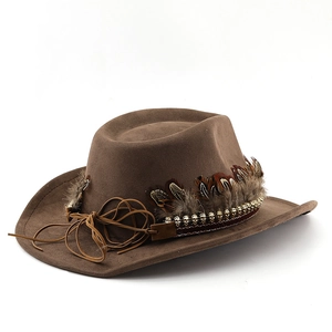 Detail of brown suede cowboy hat featuring colorful feathers and golden metal buckles