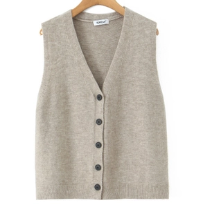 Detail of oatmeal knit V-neck vest featuring a single-breasted five-button closure