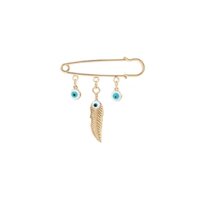 Detail of gold evil eye brooch with blue beads and a textured feather pendant