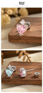 Detailed tile display of heart-cut zircon stud earrings with secure screw-back closure