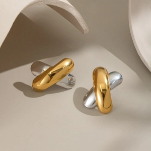 Minimalist X-shaped cross earrings in two-tone 18K gold and silver titanium steel finish