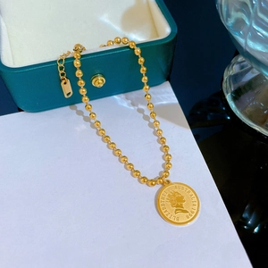 Minimalist titanium steel gold bead bracelet with Elizabeth II coin charm in gift box