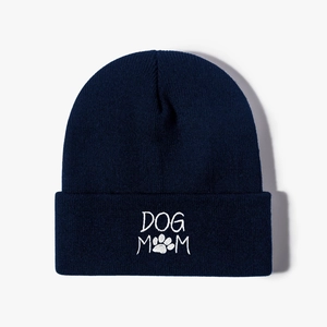 Navy blue DOG MOM embroidered knit beanie with white dog paw print on ribbed cuff