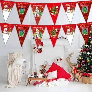 Detail of red and white Merry Christmas pennant banner hanging above a festive fireplace