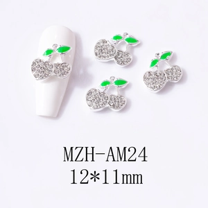 Detail of 12x11mm cherry nail charms with green enamel and clear rhinestones