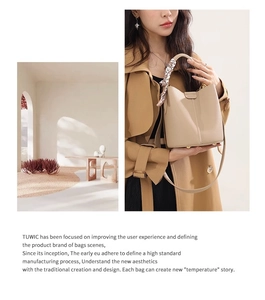 Detail of beige leather bucket bag with silk scarf handle and brand narrative