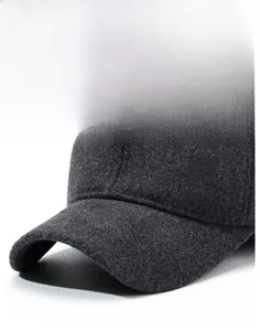 Detail view of stiff brim on dark grey wool baseball cap with 3D letter R logo embroidery