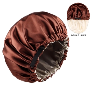 Detail of double-layer satin bonnet showing the brown exterior and champagne interior
