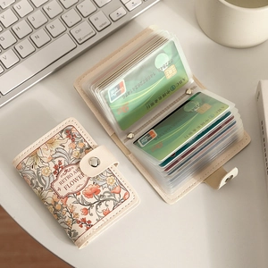 Retro floral PU leather card holder with multiple PVC slots and metal snap closure