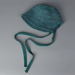 Detailed close-up showing the knit texture and tie strings of the Lolita style bonnet