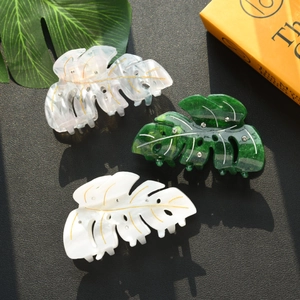 Pinces à cheveux élégantes en forme de feuille avec strass en blanc et vert