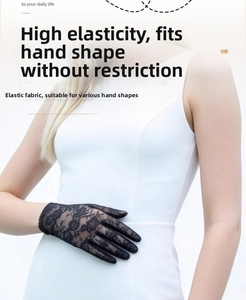 Detail of floral lace texture on long elegant gloves made from elastic stretch fabric