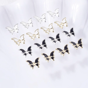 Bijoux d'ongles papillon 3D en émail noir et blanc avec cadres en alliage or et argent