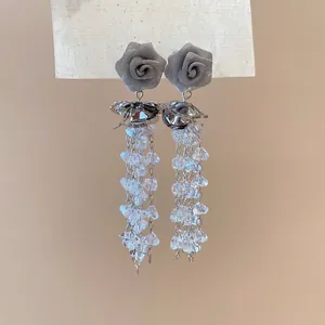 Elegant silver rose flower earrings with gray mesh petals and crystal bead tassels