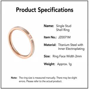 Detailed view of a 2mm rose gold titanium steel ring with white shell and single zircon