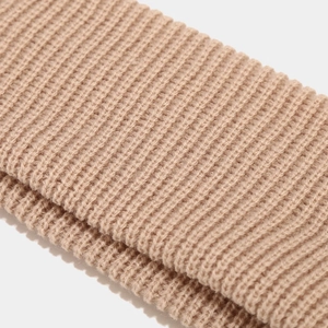 Minimalist beige ribbed knit headband featuring elastic chunky weave texture for women and men