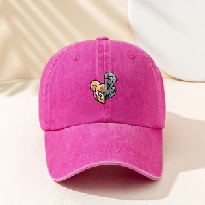 Detail of rose red washed canvas baseball cap featuring creative cartoon bear print