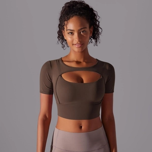 Detail of slim-fit yoga top with oval cutout and premium breathable mesh fabric