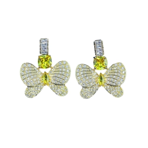 Elegant gold butterfly earrings with yellow zircon crystals and micro-pave detailing