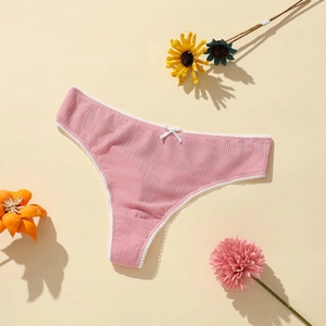 Pink ribbed polyester thong for women with white lace trim and small bow decoration