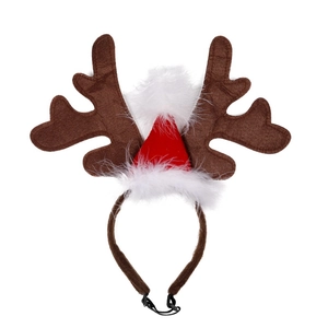 Detail of Christmas reindeer antler headband with a red hat and soft white plush trim