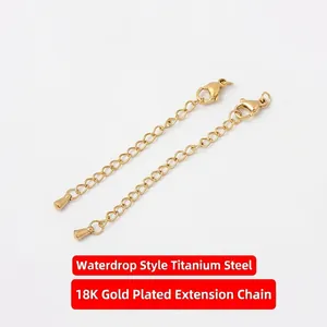 Detail of 18K gold plated titanium steel extender chains with lobster clasp and drop charm