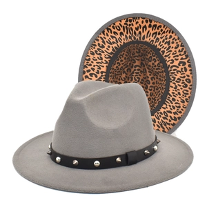 Grey fedora hat with leopard print underbrim and silver studded leather band accent