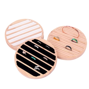 Set of 3 round solid wood jewelry display stands with beige and black velvet linings