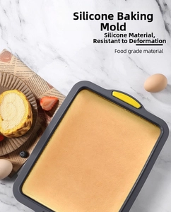 Detail of food-grade silicone brownie pan with heat-resistant handles and golden cake