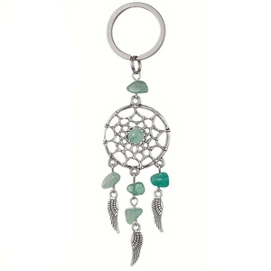 Detail of dreamcatcher keychain with green natural crystal stones and feather charms