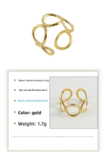 Detailed view of the 18k gold geometric interlocking ring with product specifications