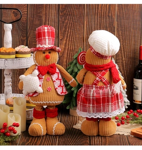 Detailed close-up of plush gingerbread man dolls set in a cozy festive holiday setting
