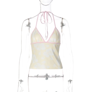 Detail of floral printed halter top with pink trim and V-neck tie-back design