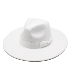 Detail of white wool wide brim fedora hat featuring matching satin ribbon and bow