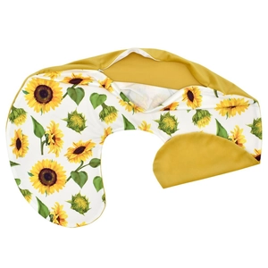 Detail of reversible U-shaped nursing pillow cover with sunflower print and yellow fabric