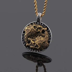 Macro detail of Nordic Viking double wolf pendant with gold accents and runic alphabet