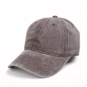 Macro shot of washed vintage cotton baseball cap texture and side stitching detail