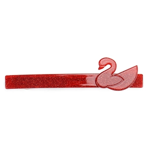 Detailed close-up of a red glitter swan-shaped hair clip with acrylic material
